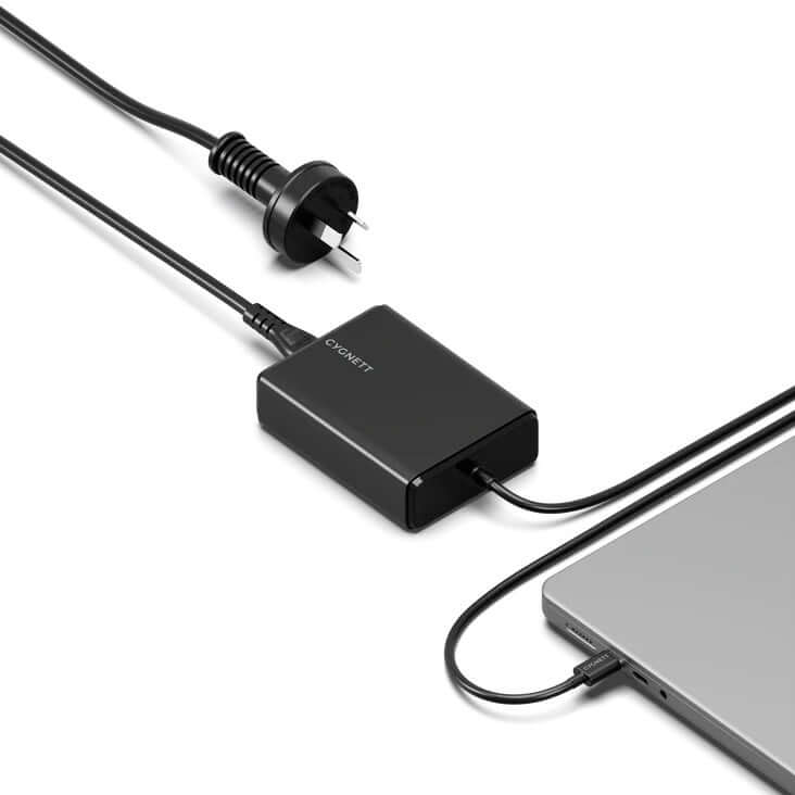 Cygnett PowerMaxx 100W PD GaN Laptop Charger with integrated USB-C cable connected to a laptop.