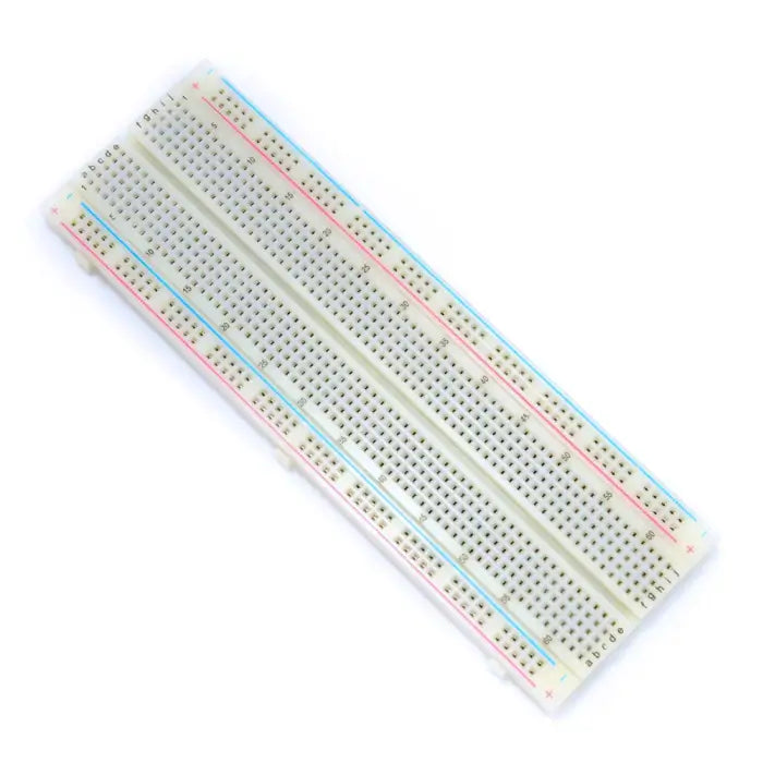 Solderless breadboard with 830 tie points and dual power rails, ideal for electronic prototyping.